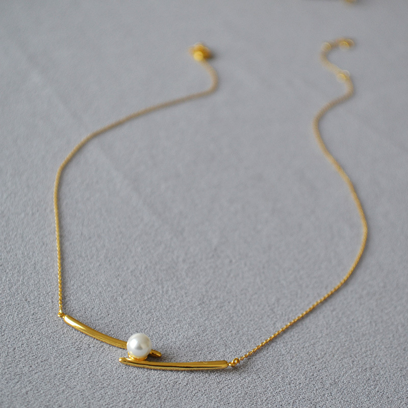 日韩小众设计黄铜镀金交叉微笑珍珠时尚简约轻奢高级感项链锁骨链详情4