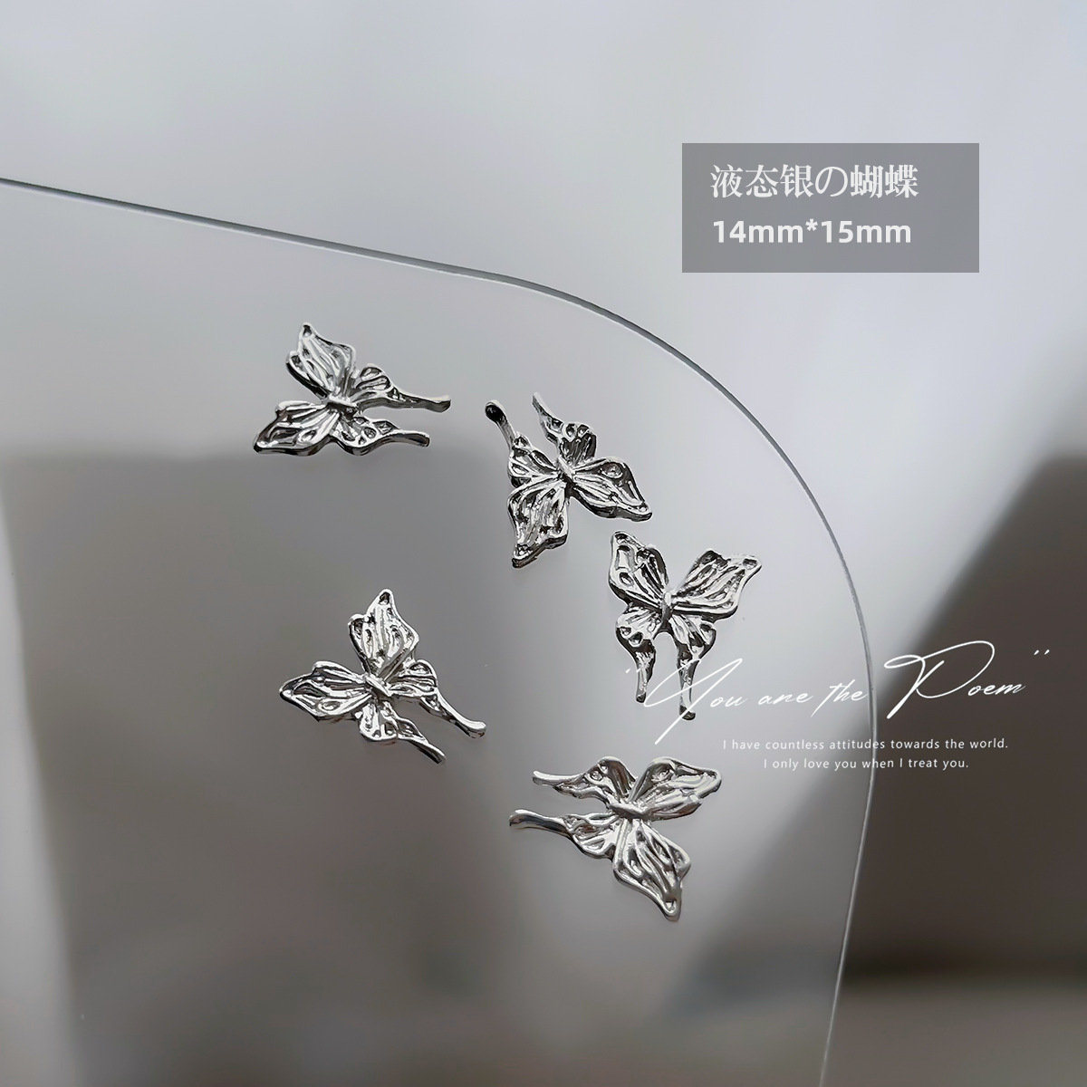 Wholesale of y2k liquid silver alloy butterfly wing hollowed-out mini bow tie nail accessories pic 12