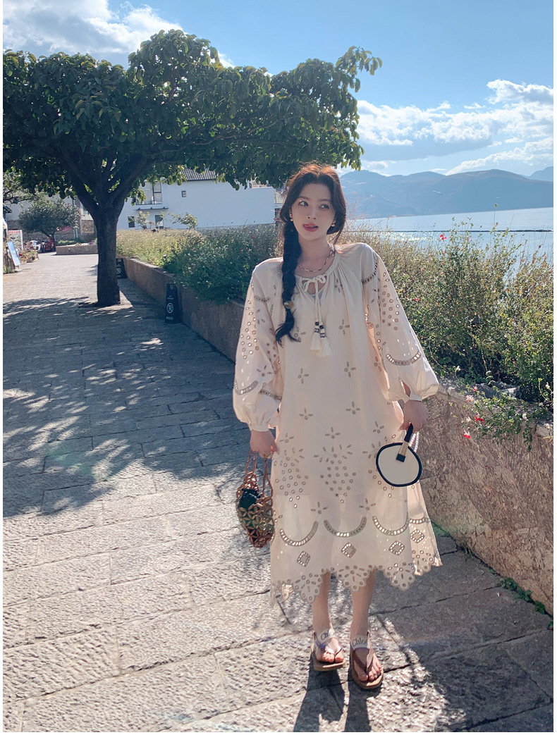 Real photo of a retro, gentle, cut-out embroidered V-neck apricot-colored dress, 2025 new seaside vacation style long-sleeved umbrella dress pic 27