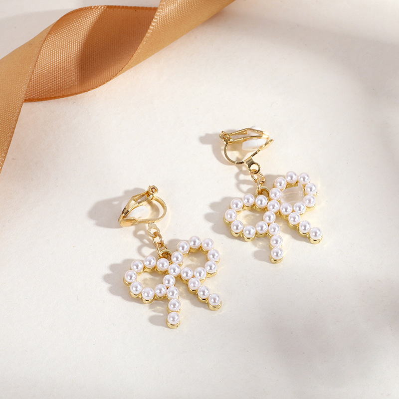 Triangular tassel ear clips, no ear holes, high-end, niche, artistic, retro, socialite ear hangers, light luxury, high-quality earrings wholesale pic 12