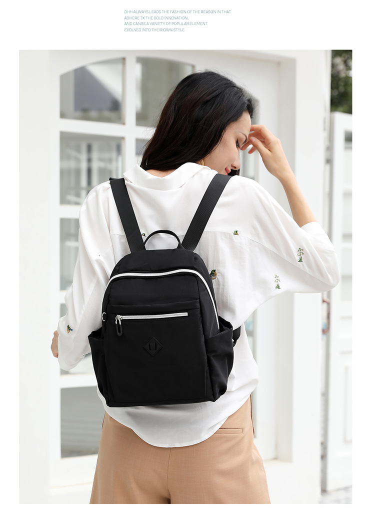 大容量双肩包女士时尚潮流韩版背包防泼水出行旅行包情侣韩版书包详情23