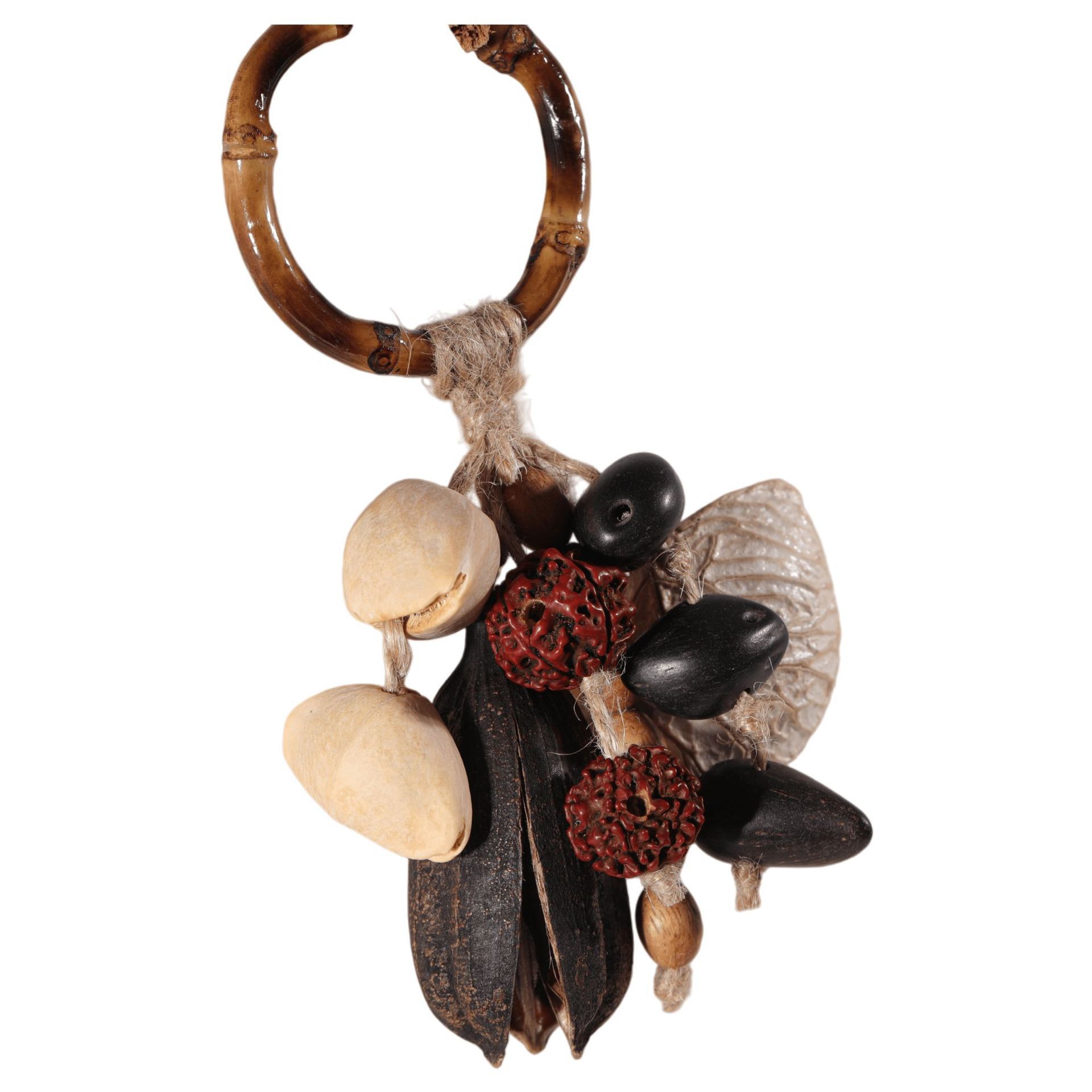 Indonesian handmade fruit shell wind chimes, natural Musical Instruments, sound therapy hand-cranked bells, fruit shell cranked bells, diy wind chime bags, hanging ornaments pic 15