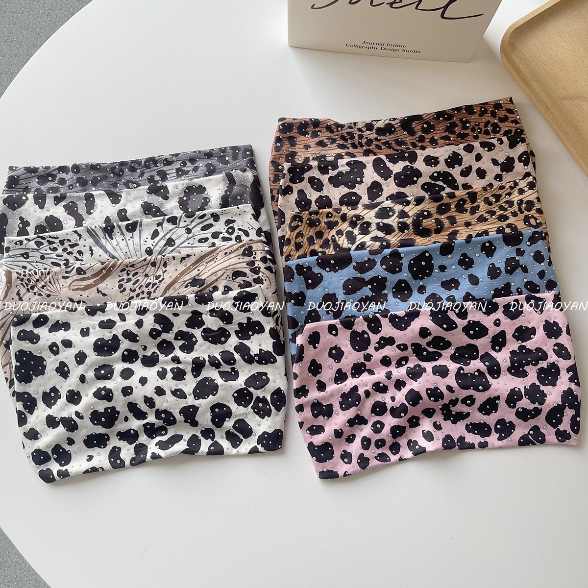 The new leopard print hot diamond hair band is a fashionable and hot girl. The wide-edge knotted elastic hair band is a sports sweat-absorbing headscarf for women pic 11
