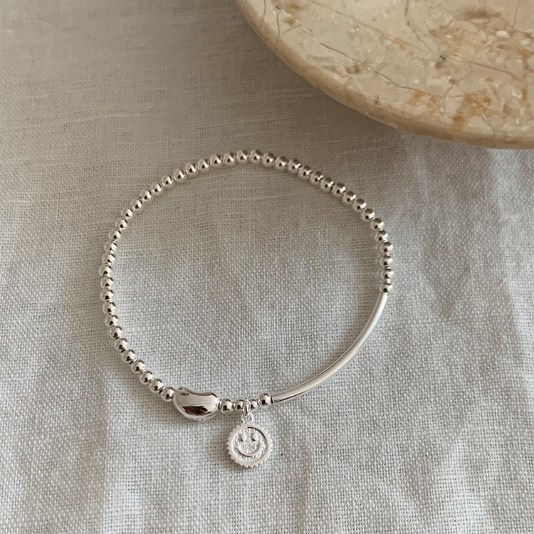 S925 sterling silver smiley face bean elastic beaded bracelet: simple and versatile, light luxury, ins niche jewelry with a sense of sophistication pic 7