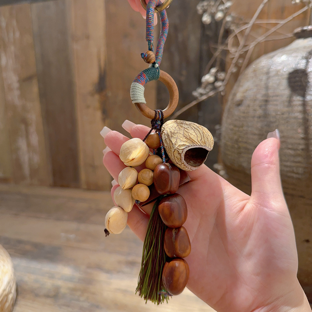 Natural fruit shell wind chime pendant, forest-style plant healing bell, full wish seed string, stress-relieving sound therapy bag, car pendant pic 9