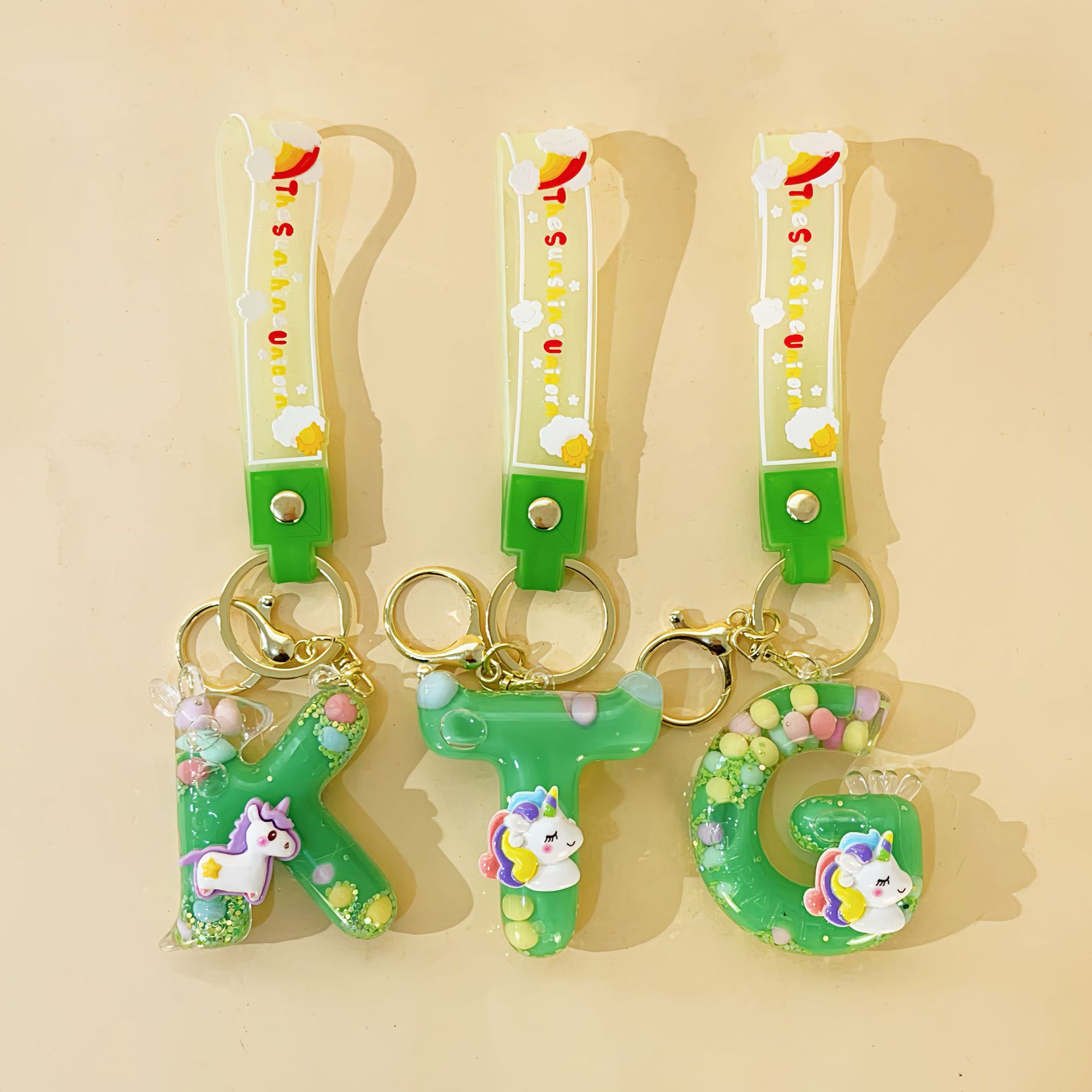 入油26字母钥匙扣包包挂件迷你流沙瓶情侣汽车钥匙链挂饰礼品批发详情12