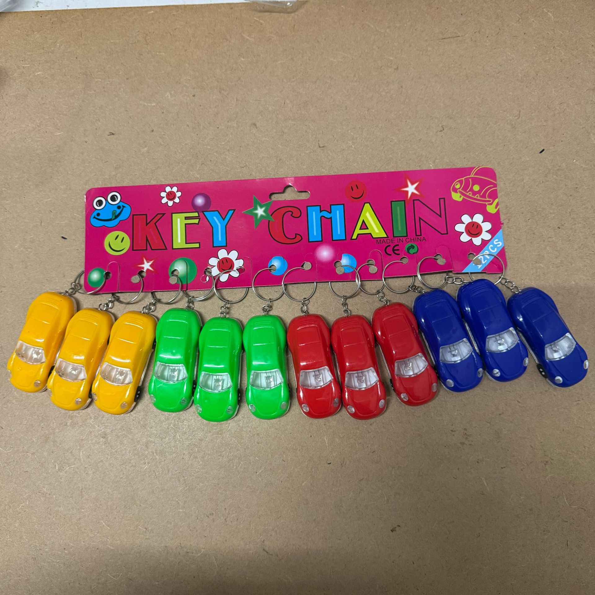 Wholesale of luminous toy car keychains, student bag pendants, fashionable car key pendants, sports car small gifts pic 6