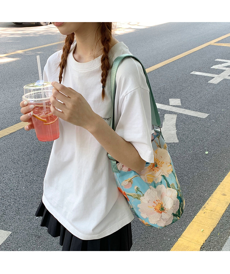 大容量国风印花水桶包女创意花卉个性手提单肩包设计感休闲斜挎包详情31