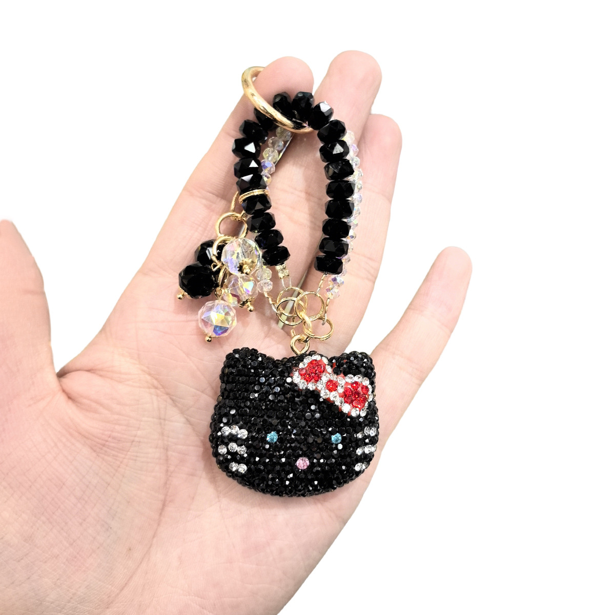 Cross-border light luxury full-diamond cartoon cat diamond rope pendant, creative car keychain, cute couple bow bag pendant pic 5
