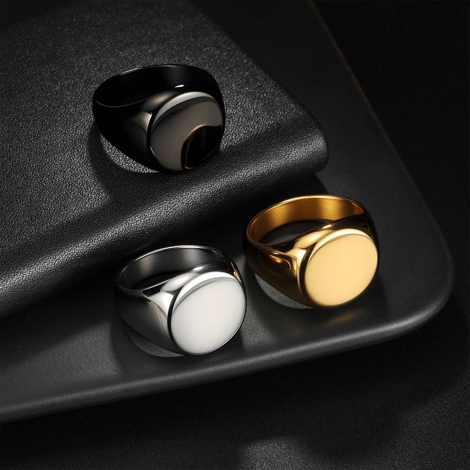 In 2025, the popular titanium steel ring for men on Amazon in Europe and America, a large circular cast ring with a logo, temu pic 3