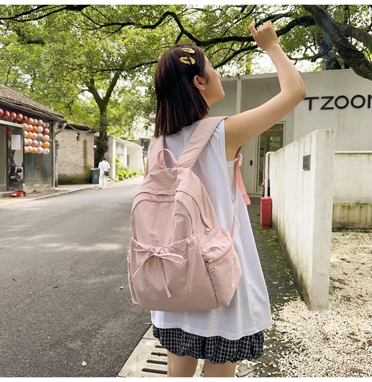 新款时尚轻便简约双肩包女日系文艺学生书包休闲运动旅行纯色背包详情14