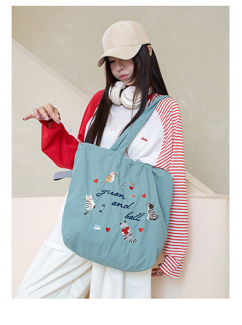 韩版新款百搭日系束口刺绣手提袋日常通勤清新学生大容量托特包女详情13