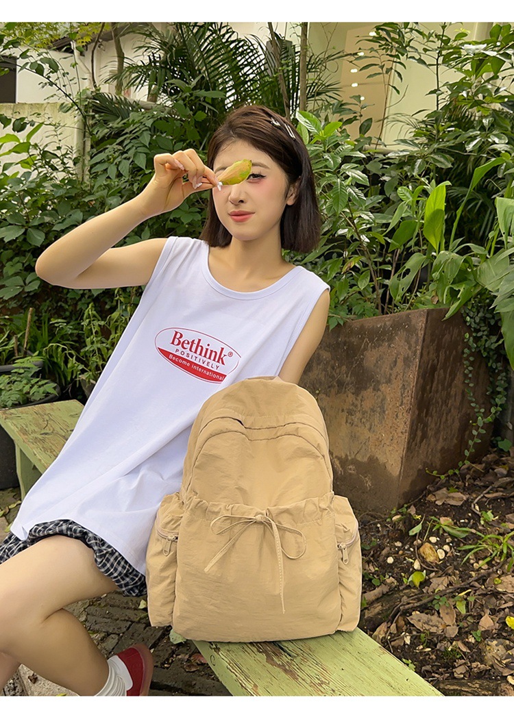 新款时尚轻便简约双肩包女日系文艺学生书包休闲运动旅行纯色背包详情9