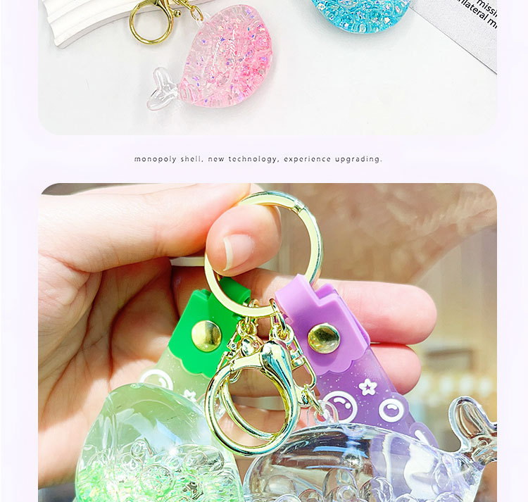 Oil-filled sand bottles, dolphin and whale keychains, bubble beads, key chains, luminous drift bottles, car schoolbags, pendants, ocean oil-filled keychains, pendants wholesale pic 5