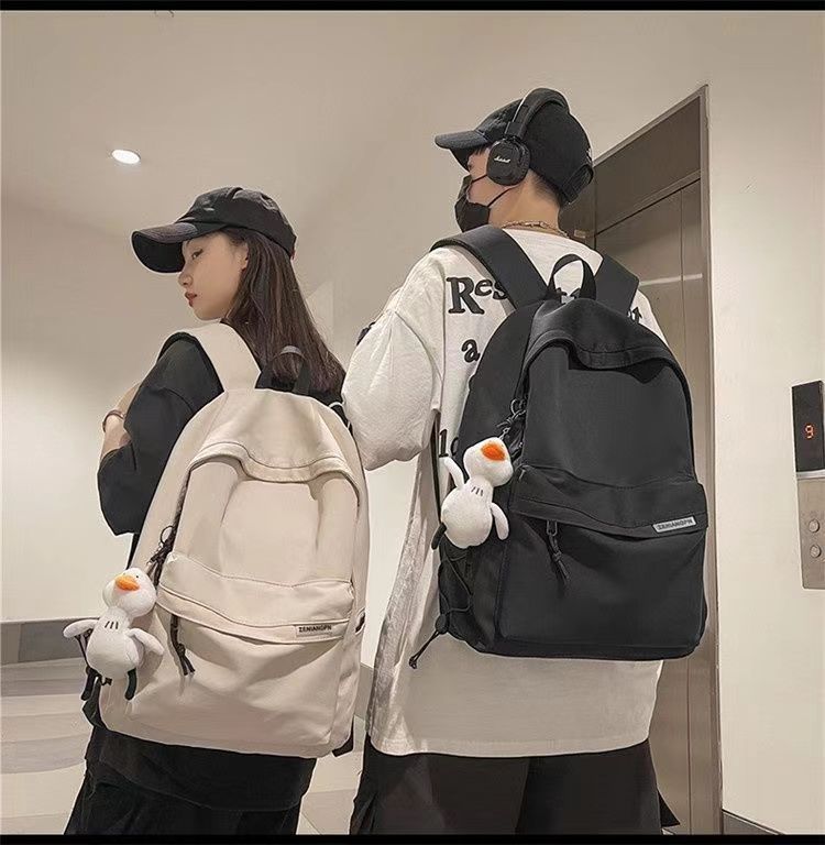 日系初高中学生上课书包男新款洋气质感纯色简约休闲女生双肩背包详情6