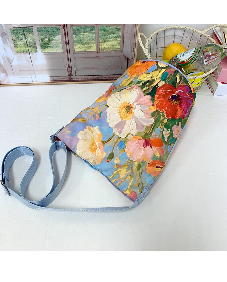 大容量国风印花水桶包女创意花卉个性手提单肩包设计感休闲斜挎包详情21