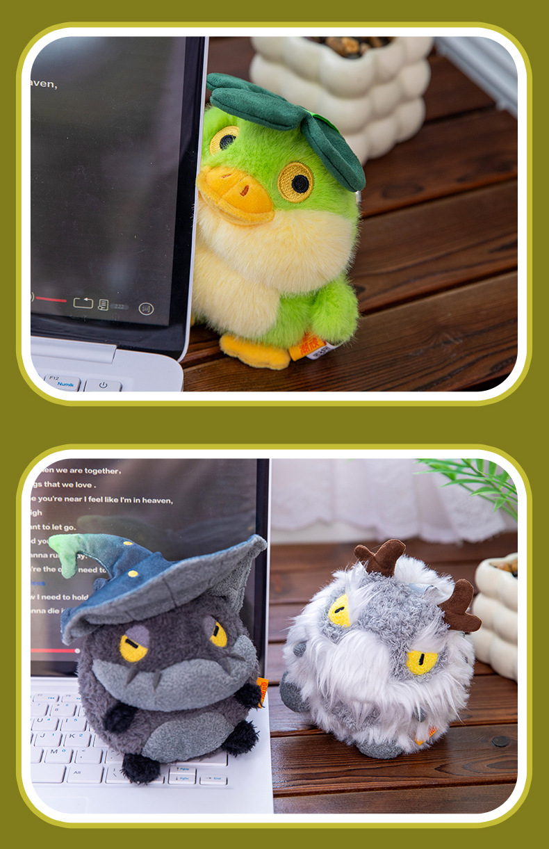 A grey totoro wearing a wizard hat and a red horned dragon plush toy AI star Man AI toy pic 15
