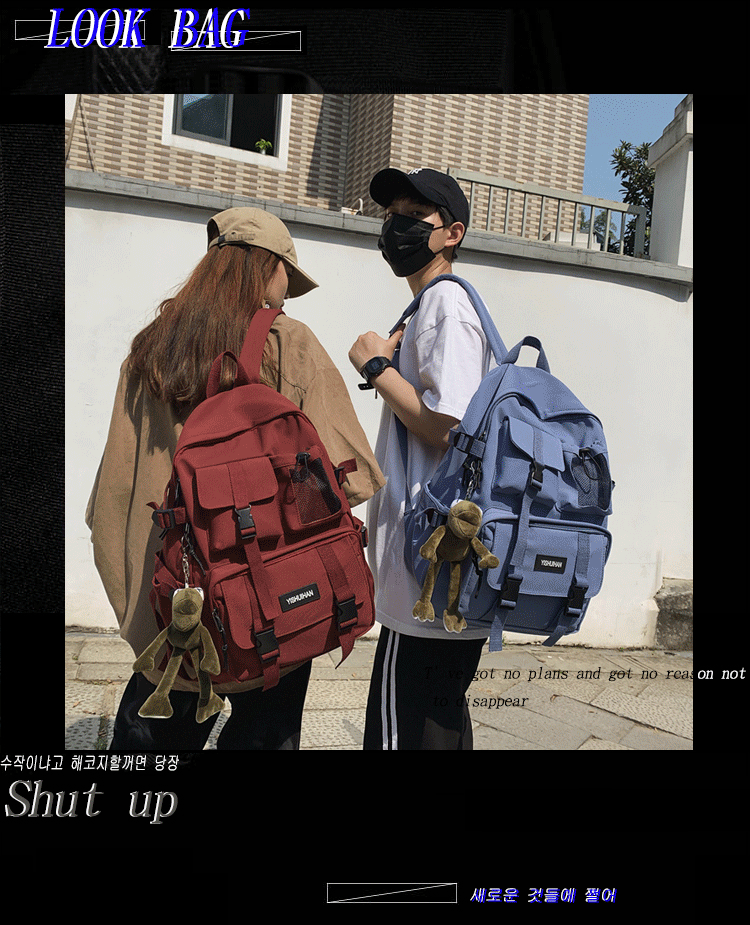 休闲百搭男女双肩包可爱挂件洋气潮流学生书包大容量工装风背包详情1