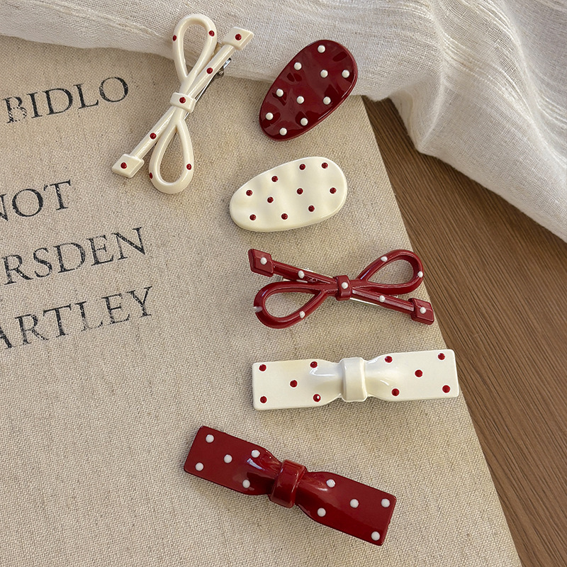 甜美波点蝴蝶结椭圆发夹女前额侧边刘海夹碎发鸭嘴夹儿童发卡头饰详情2