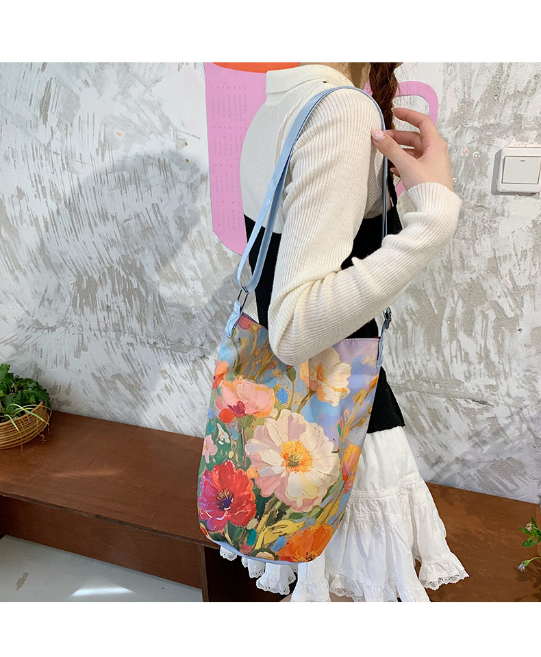 大容量国风印花水桶包女创意花卉个性手提单肩包设计感休闲斜挎包详情44