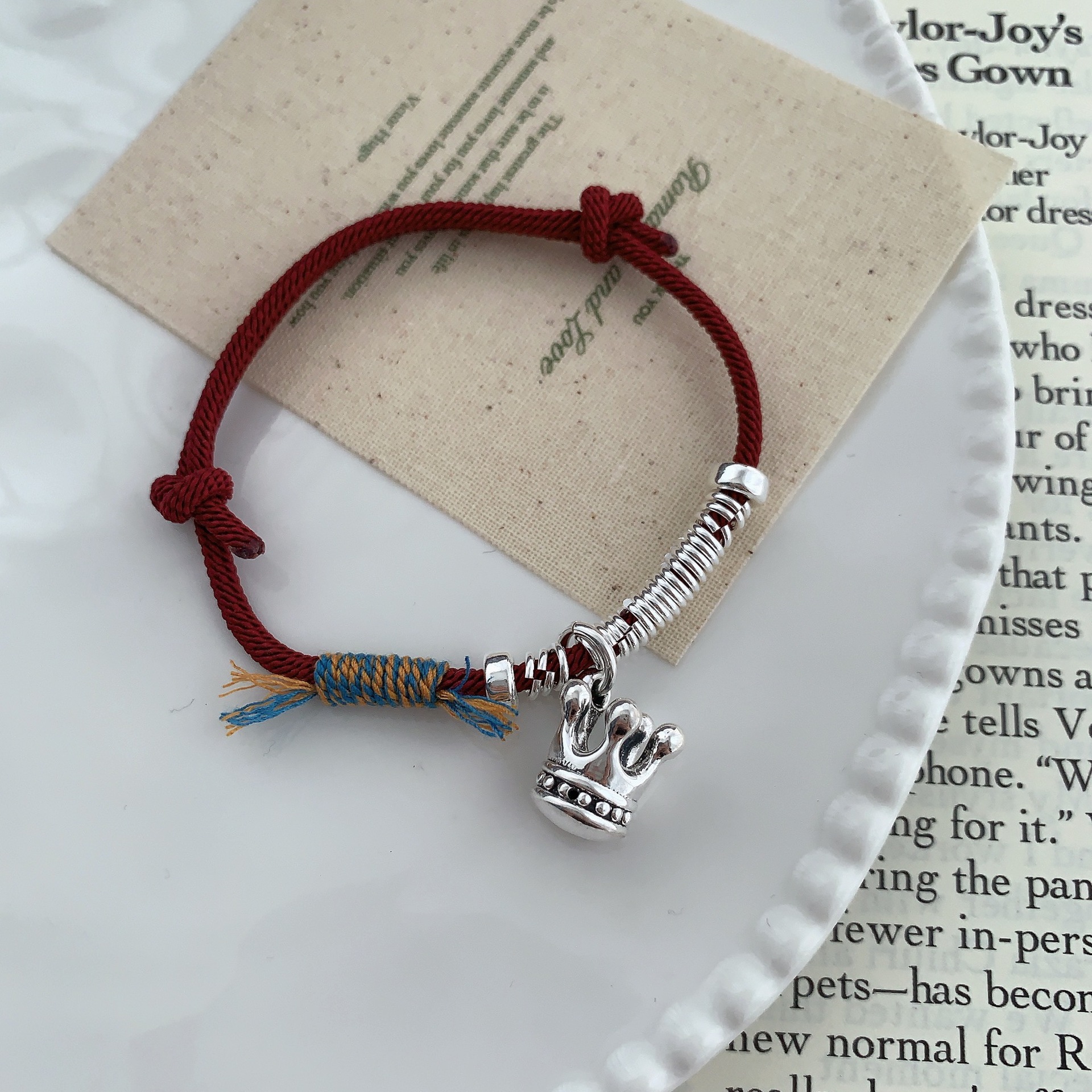 A unique and retro 12.12 crown coiled red string S925 sterling silver bracelet with a niche design, exuding a sense of light luxury and high-end fashion pic 1