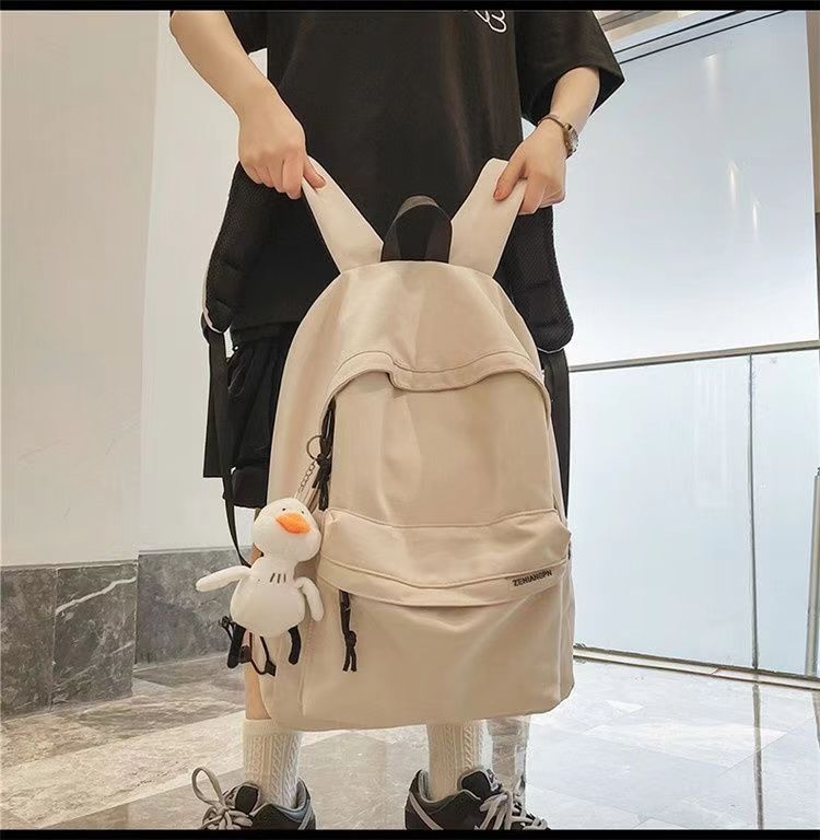 日系初高中学生上课书包男新款洋气质感纯色简约休闲女生双肩背包详情9