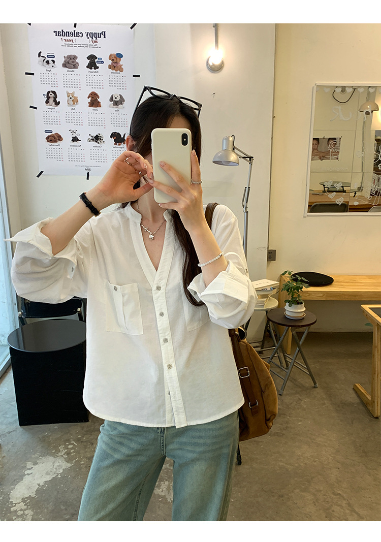 现货热销韩系半排扣正肩V领宽松长袖衬衫女通勤新款独特设计感上详情17