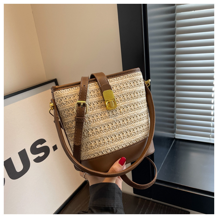 时尚手提编织包包女2023新款高级质感草编包单肩斜挎包休闲水桶包详情27