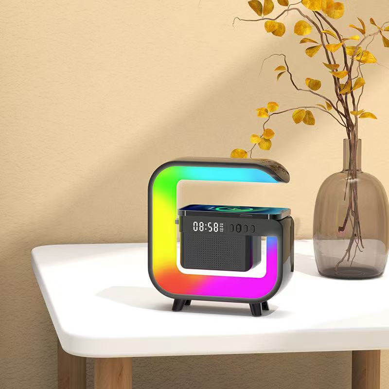 The white Bluetooth speaker features a colorful ring-shaped light effect, digital display, and wireless charging at the top, supporting K12 Bluetooth audio equipment pic 1