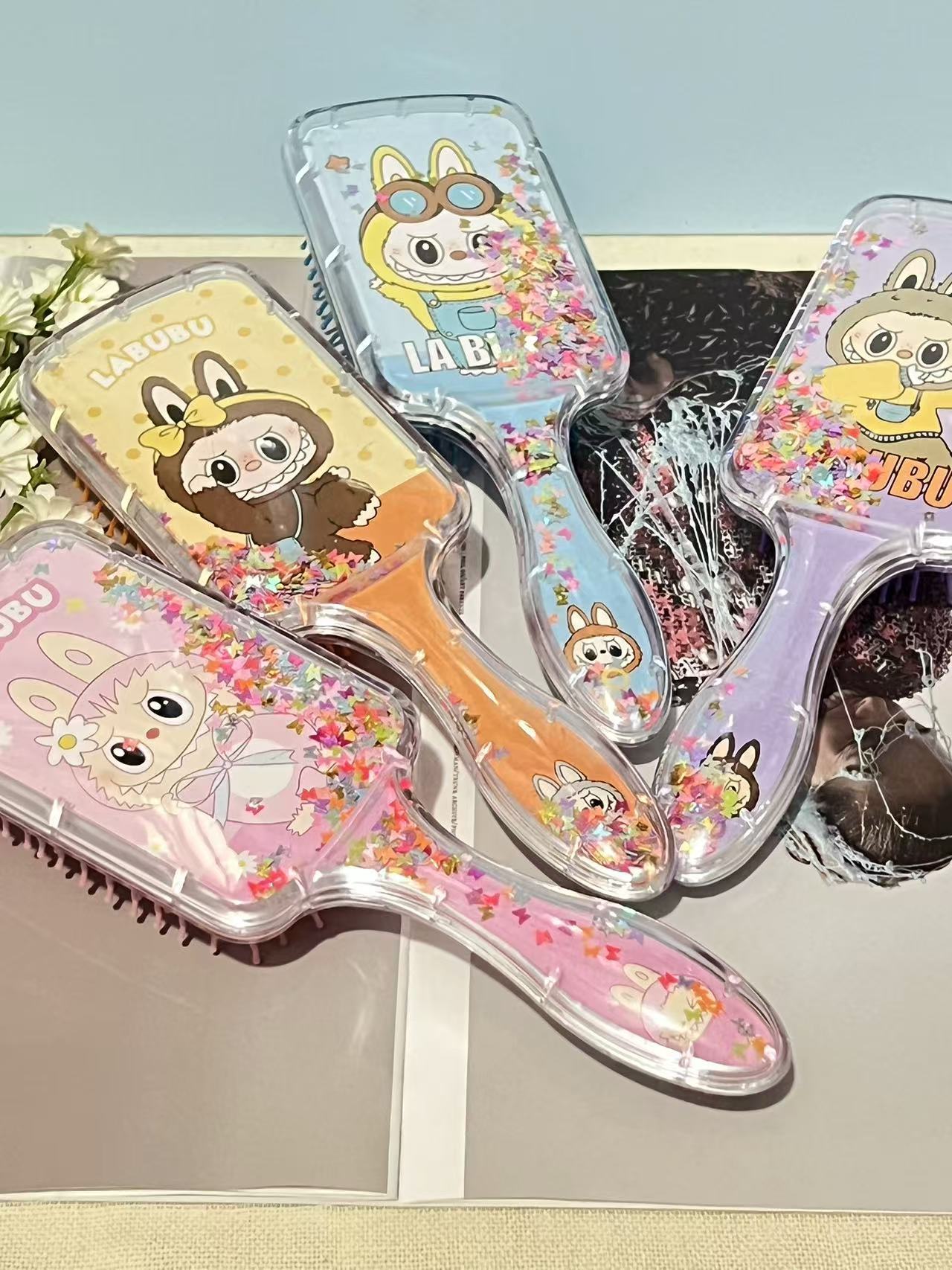 史迪仔儿童美发梳可爱卡通KT猫三丽欧气垫流沙梳气囊梳可挑款详情7