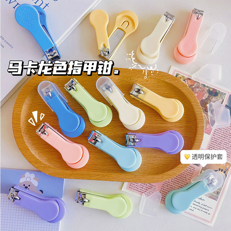 Macaron-colored creative nail clippers, portable nail clippers with protective covers, household anti-splash nail clippers wholesale pic 1