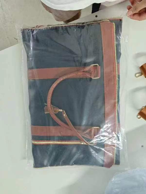 In-stock storage luggage bags, leather folding suit bags, large-capacity hand-held clothing luggage, travel crossbody clothing bags pic 9