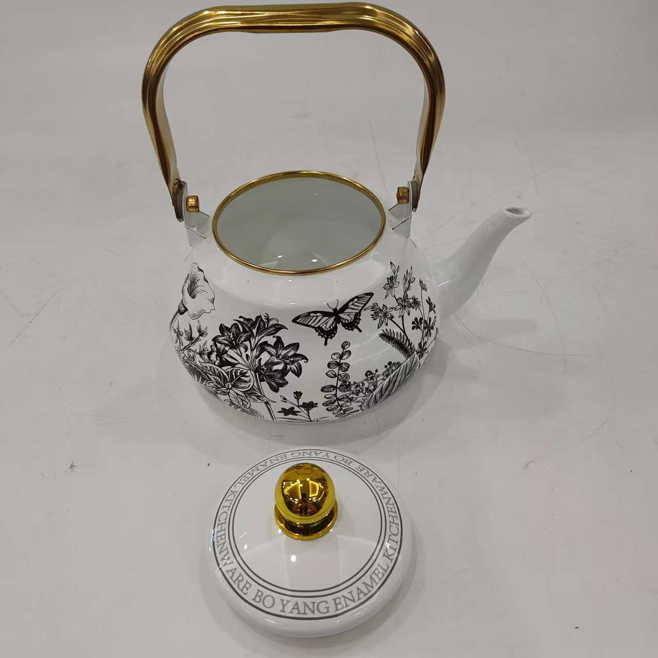 TK121梨形金色手柄搪瓷水壶适用煤气灶电磁炉健康环保凉水壶日用百货茶具茶壶详情5