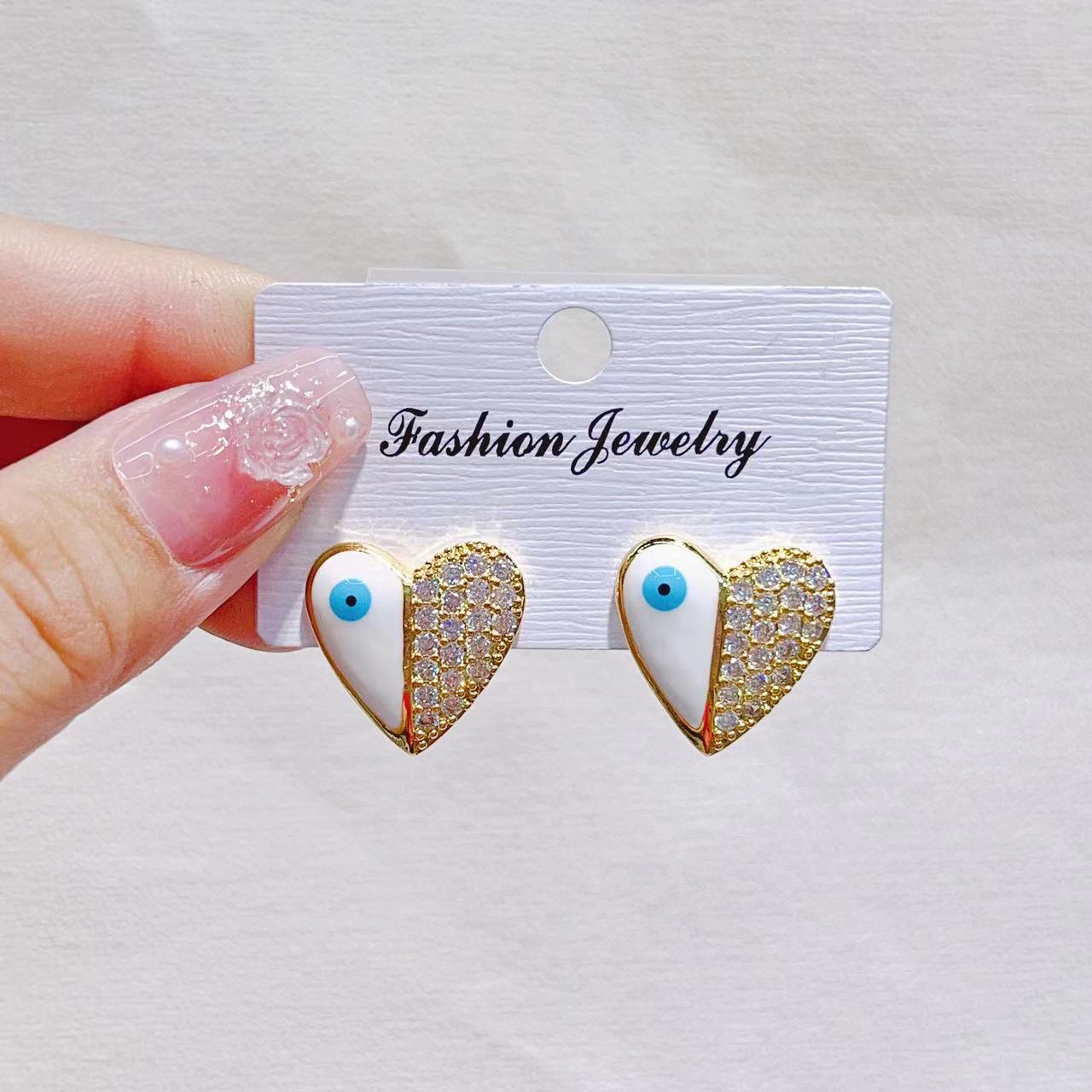 High-end stud earrings, a niche design for women, heart-shaped butterfly copper plated with real gold zircon, a light luxury and versatile style pic 3