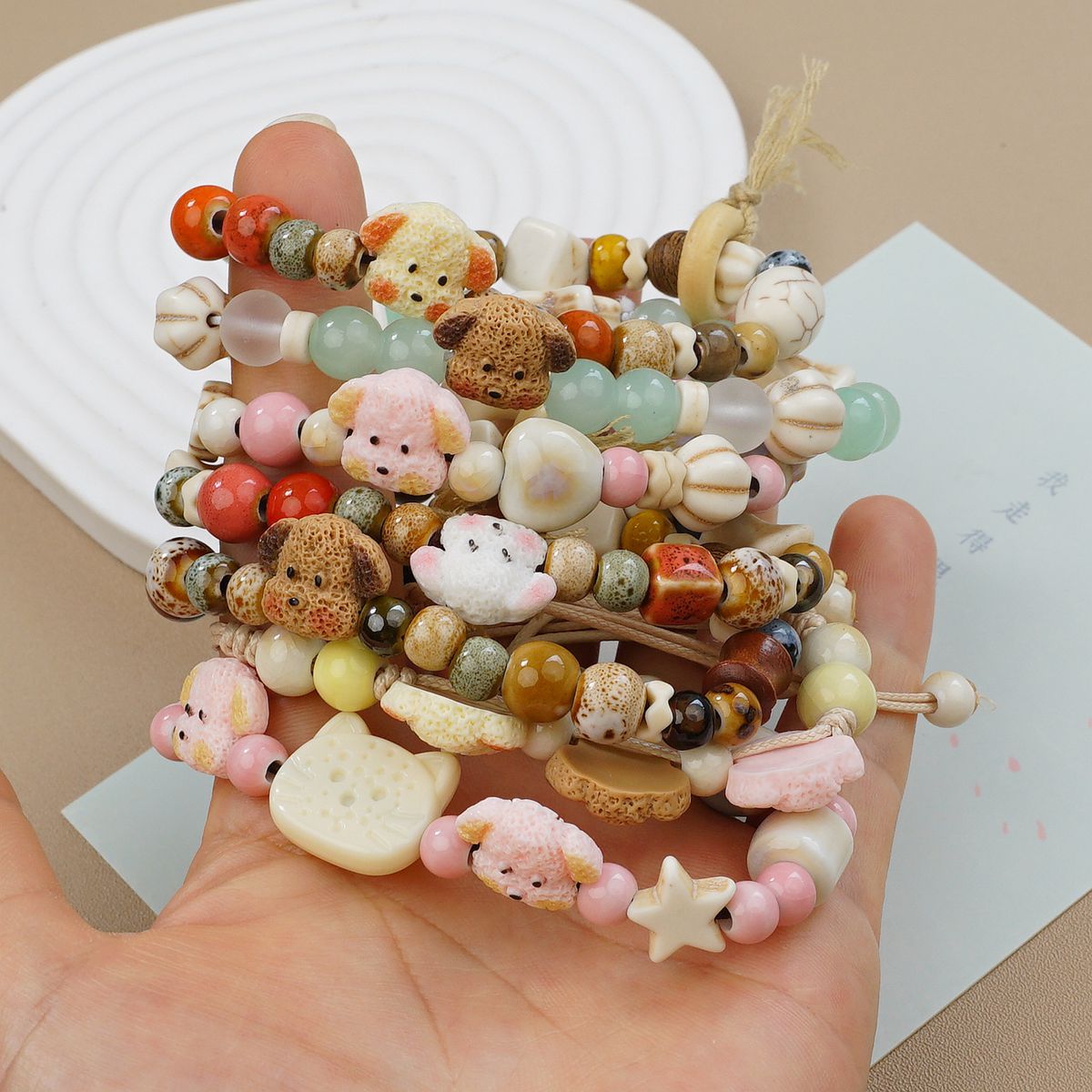 Jingdezhen ceramic bracelets, cartoon with texture, Teddy dog handcrafted ornaments, bracelets, student gifts, and street vending accessories pic 1