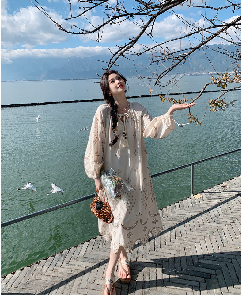 Real photo of a retro, gentle, cut-out embroidered V-neck apricot-colored dress, 2025 new seaside vacation style long-sleeved umbrella dress pic 11