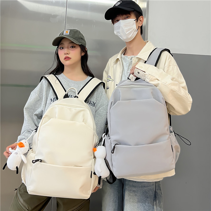韩系大容量纯色双肩包女韩版简约百搭书包男初中背包女双肩大学生详情4
