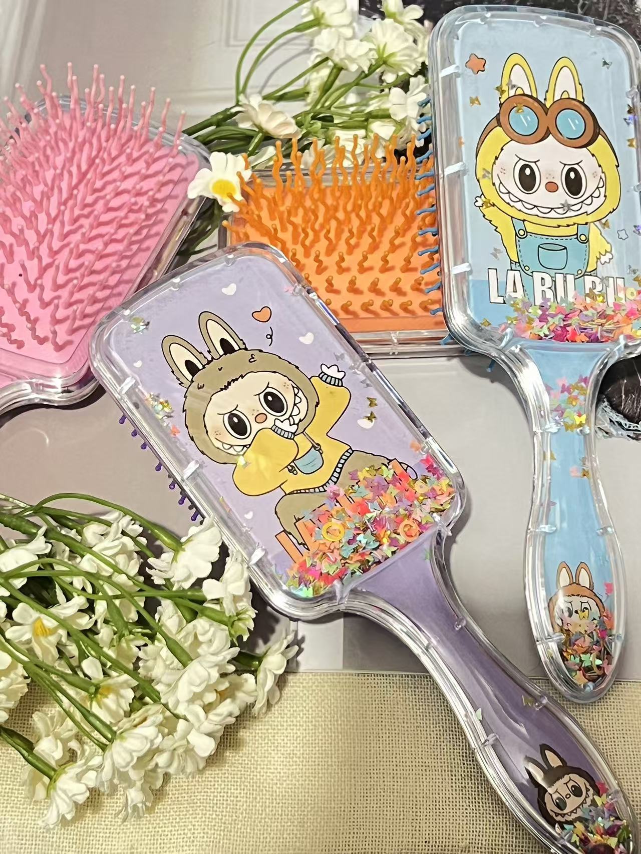 史迪仔儿童美发梳可爱卡通KT猫三丽欧气垫流沙梳气囊梳可挑款详情8