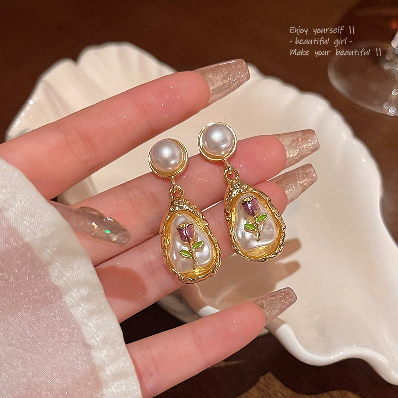 Spring/Summer 2025 fresh and elegant flower earrings for women, a light luxury and high-end look, pearl stud earrings, super fairy-like, versatile and elegant earrings pic 25
