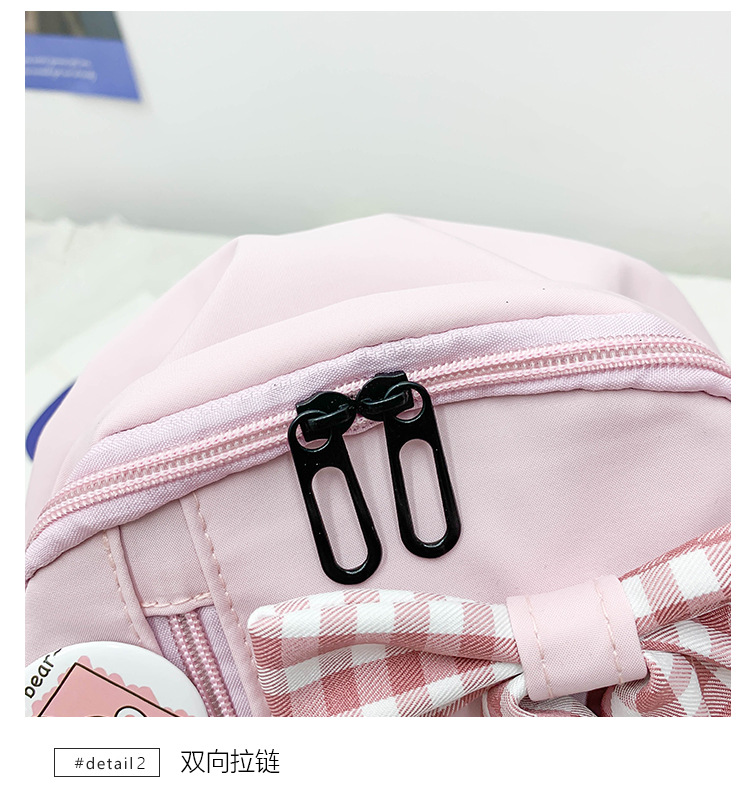 蝴蝶结书包女小学生大容量三到六年级初中轻便减负可爱简约双肩包详情25