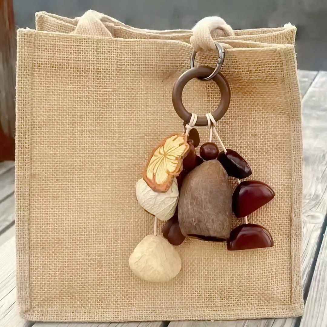 Fruit shell bell, hand-cranked bell, wind chime bag, handcrafted sound beam, bell pendant, wholesale from Indonesian black fruit shell factory pic 10