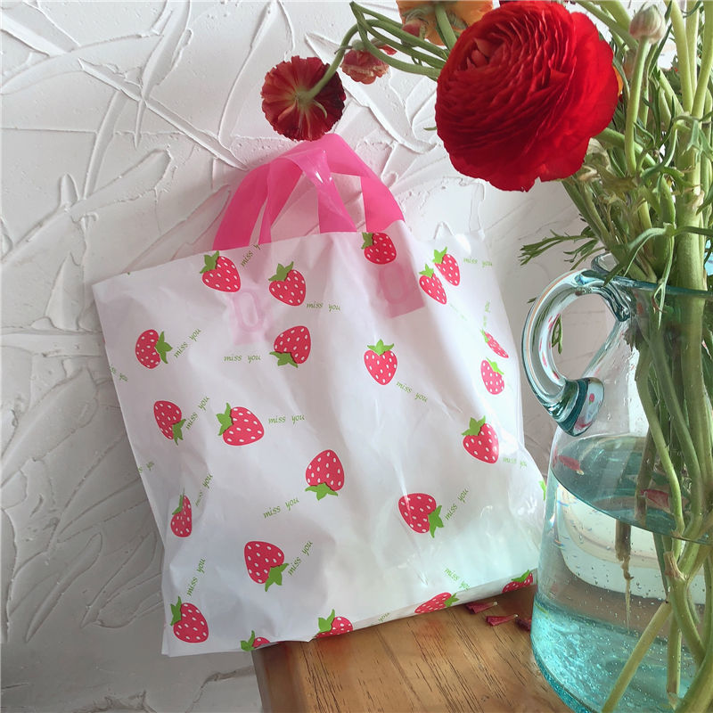 服装店袋子手提塑料袋夏日水蜜桃清新诱惑塑料购物袋化妆品袋包邮详情8