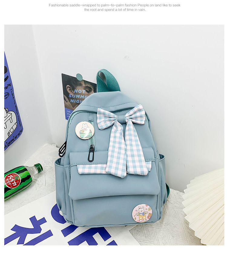 蝴蝶结书包女小学生大容量三到六年级初中轻便减负可爱简约双肩包详情12