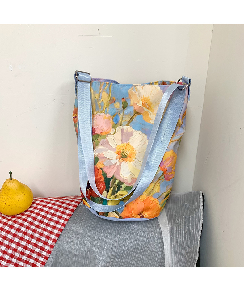 大容量国风印花水桶包女创意花卉个性手提单肩包设计感休闲斜挎包详情13