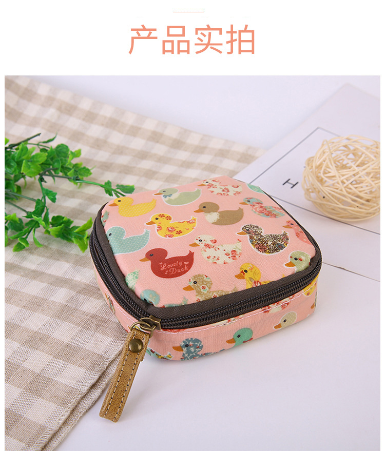 厂家直销韩国布艺防水大容量拉链卫生棉包姨妈巾化妆品收纳零钱包详情8