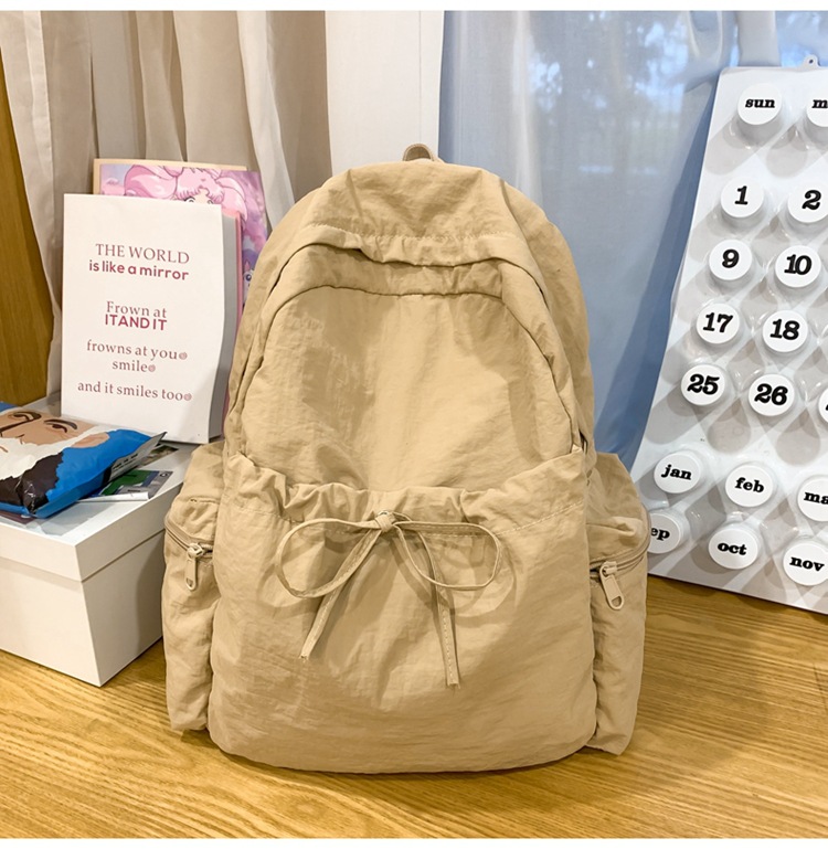 新款时尚轻便简约双肩包女日系文艺学生书包休闲运动旅行纯色背包详情44