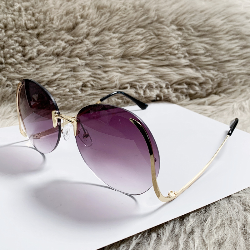 New cross-border frameless trimmed sunglasses for women, round lenses, European and American fashionable sunshade decorative sunglasses, UV-protective and sun protection fashionable and trendy women's sunglasses Application Scenario