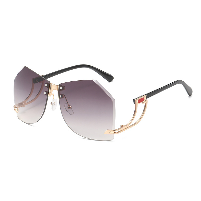 Fashionable frameless edge-cut women's sunglasses, trendy and individual, with irregular design of hollowed-out temple, ocean plate sunglasses and UV-resistant sunglasses Item Picture