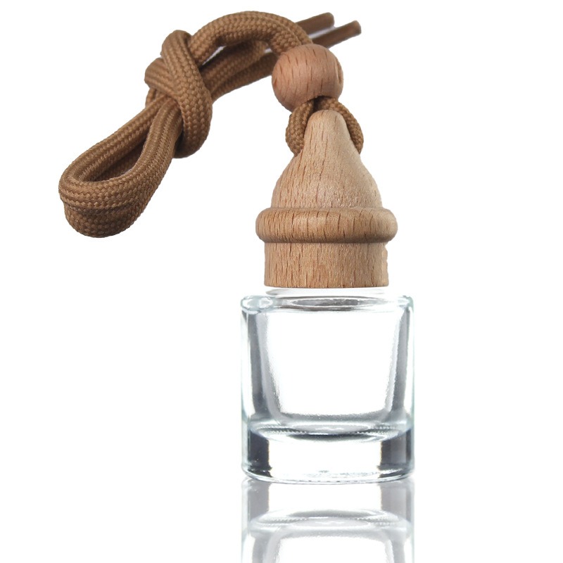 In stock, there are 8ml car perfume portioned bottles, glass bottles with hanging decorations, empty bottles, round bottle designs, wooden caps, and exquisite, durable, and convenient to carry Item Picture