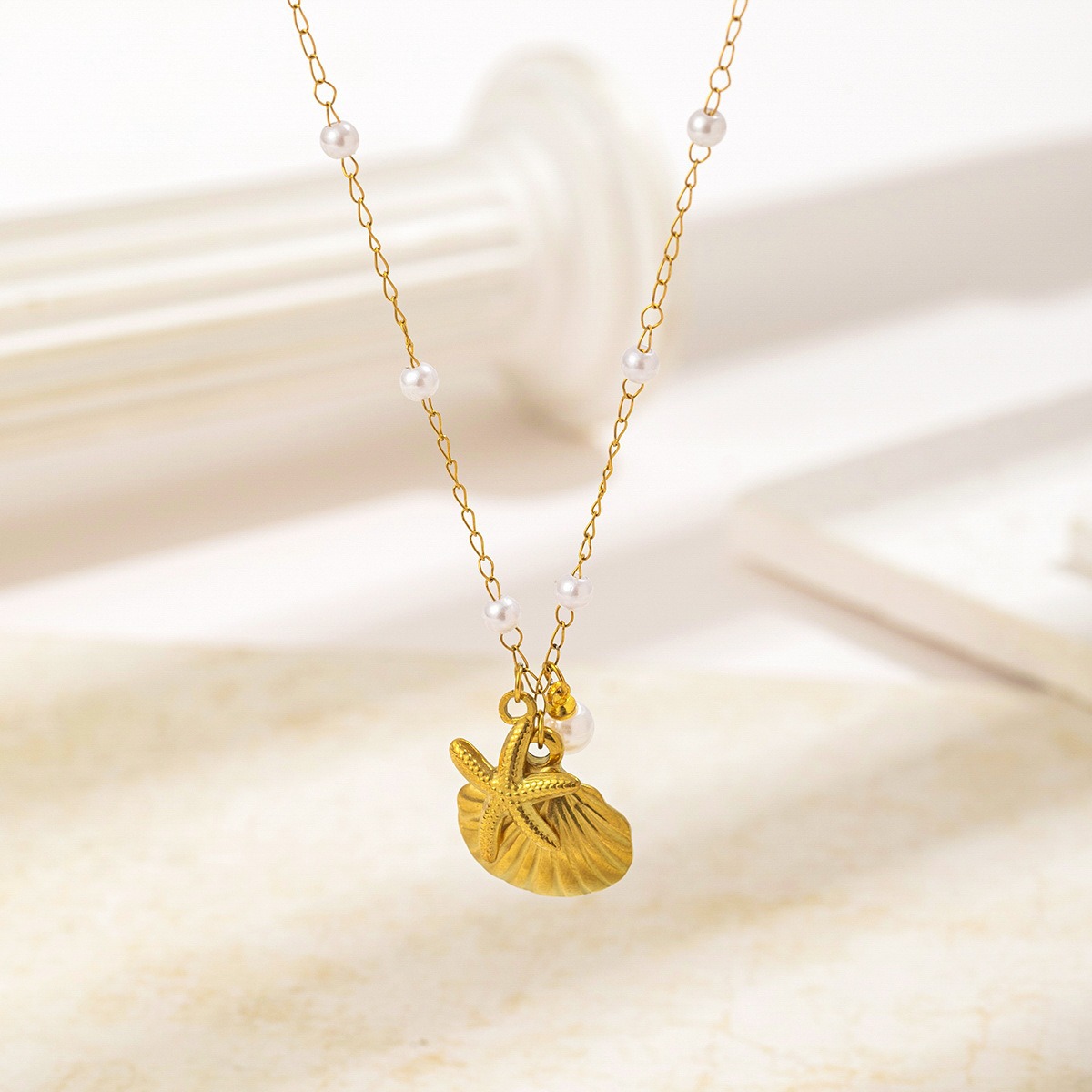 New product launch: European and American cross-border fashion, versatile. Starfish shell design, pearl embellishment for the ocean series of accessories. Wholesale price. Stainless steel necklace, anti-allergy and wear-resistant Specification image